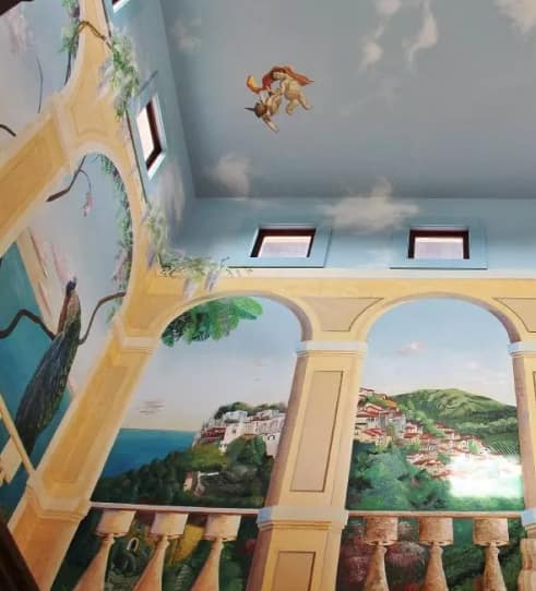 Hand-painted Tuscan mural ceiling and walls inside Blue Sky Vineyard.