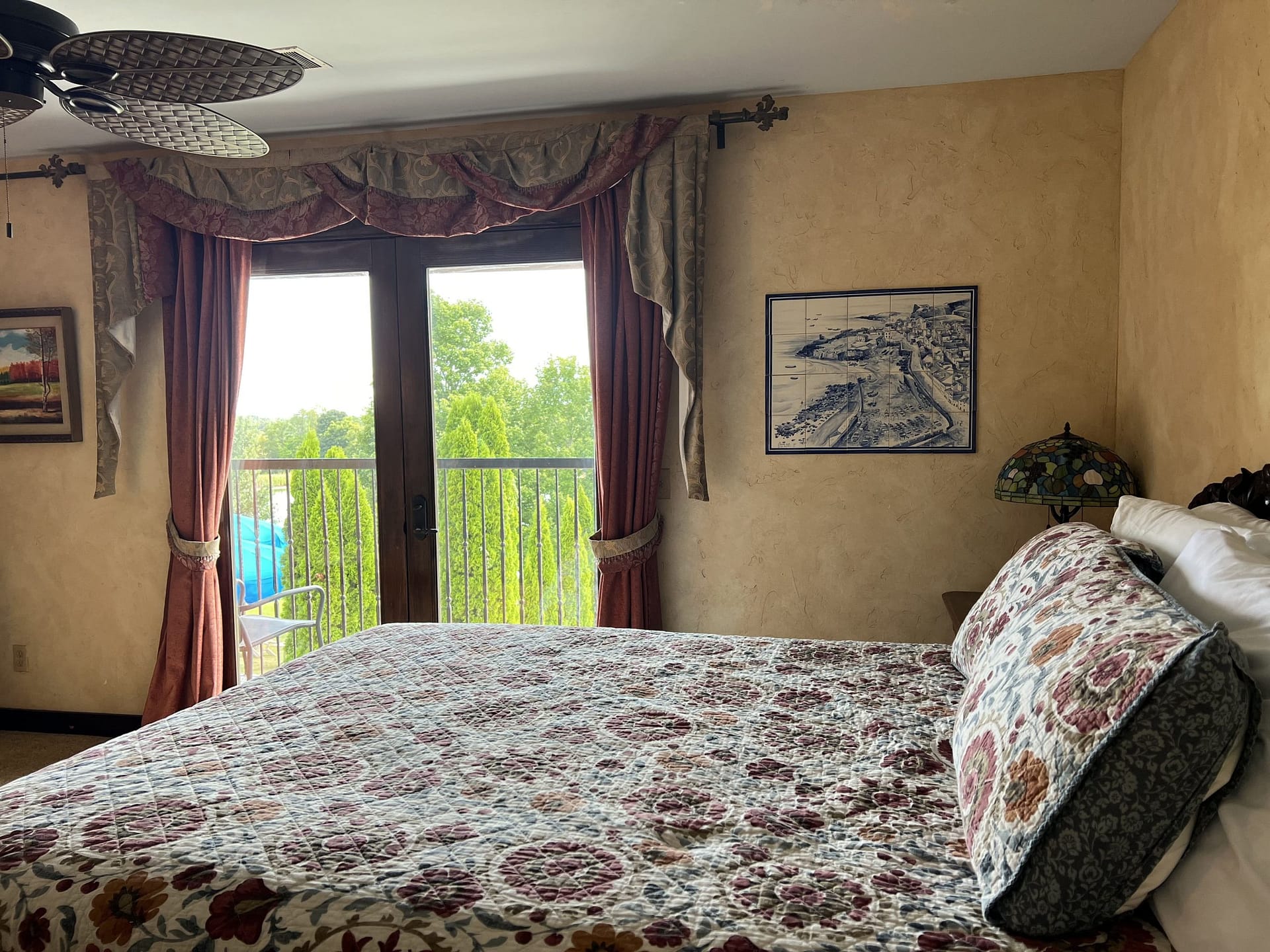 ineyard suite with balcony view overlooking Blue Sky Vineyard estate.